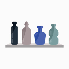 set of bottles on a wall shelf on a white background