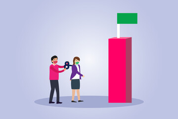 Businessman controlling a woman with a windup key to take a flag