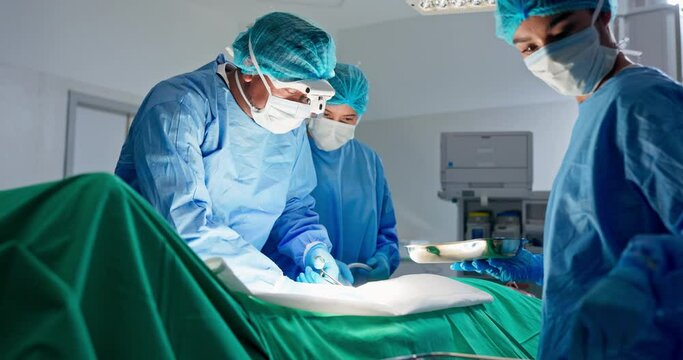 Nurses, doctors and surgery in operating room at emergency healthcare clinic with medicine. Health, cardiology and surgeon team in hospital theater with wellness, support and help with medical tools