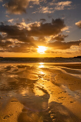 Sunset on the beach at Trearddur bay Beach, Anglesey, Wales