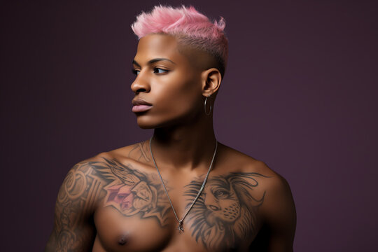 A man with vibrant pink hair and intricate chest tattoos