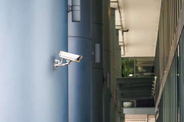 Outdoor CCTV Security camera installed on the building in the city