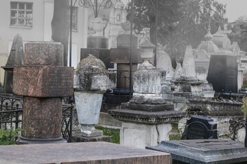 Old cemetery with atmospheric gravestones and monuments