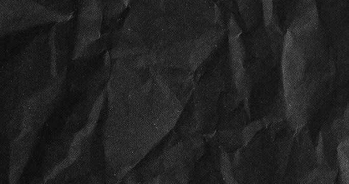 Crumbled paper grungy stop motion animation seamless looped. animation of pastel black color Grunge noise texture of a paper surface stop motion animation