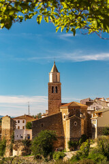 Fototapeta na wymiar Vertical view of the village of Cortes de Arenoso, in Castellón, Spain, with its church in the center.