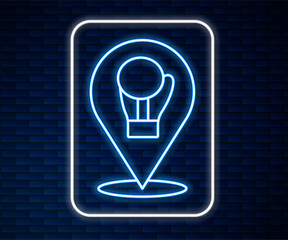 Glowing neon line Boxing glove icon isolated on brick wall background. Vector