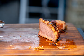 roast pork on a wooden board