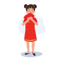 Cute Little Boy in Traditional Chinese Attire Holding Red Envelope. Happy Chinese new year.