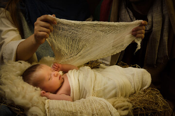 Swaddled baby live nativity scene - 662247117