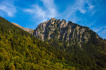 Obraz premium Vacation in Mountains. Traveling and adventure concept. Alps landscape, tourism concept scene 