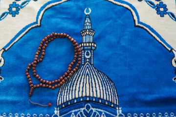 tasbih. Prayer beads. Islamic background. Ramadan kareem. Selective focus. on sajadah or prying...