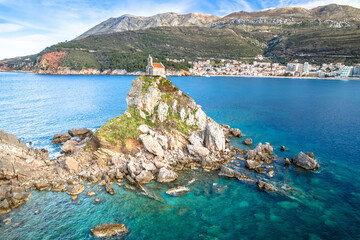 Church on the rock on Katic islet in Petrovac aerial view - obrazy, fototapety, plakaty