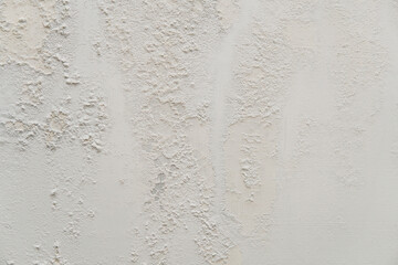 old white wall with mold texture background. messy wall stucco texture