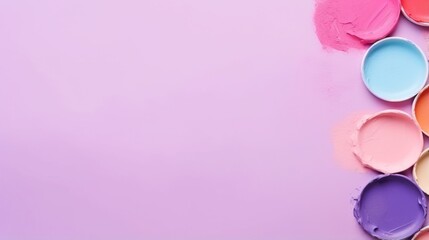  a group of paint colors on a pink background with a place for a text.  generative ai