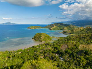 Fototapeta na wymiar Tropical island in sleeping dinosaur formation. Mindanao, Philippines. Summer and travel concept.