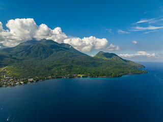 Tropical Island surounded by deep blue sea. Camiguin Island. Philippines.