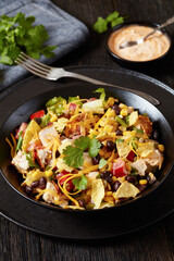 mexican rotisserie chicken salad in black bowl