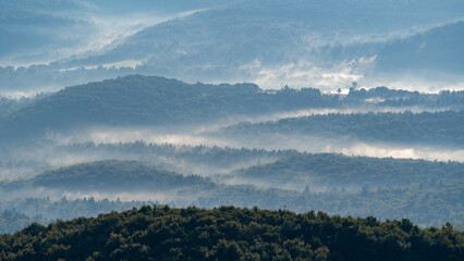 landscape with fog, mountains and fog