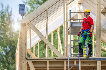Fototapeta premium Professional Construction Worker and the House Project