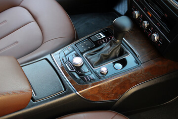 Gear lever. Automatic transmission lever shift. Modern car luxury car brown leather interior. © Best Auto Photo