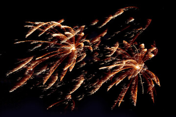 beautiful fireworks gold color isolated on black background