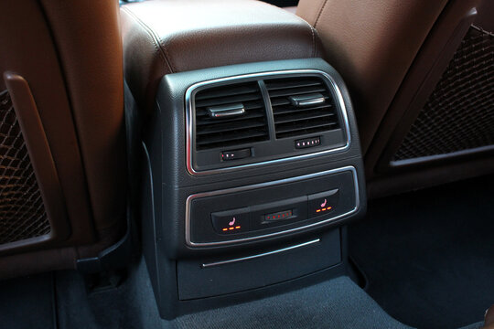Climate control unit for rear passengers in a car with a USB-C and Type-C charger, 220 volt socket