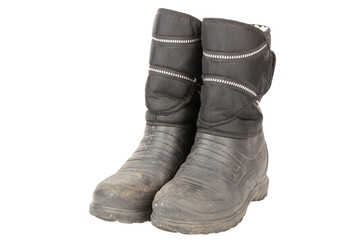 Dirty insulated old boots on a white background. Hiking boots.