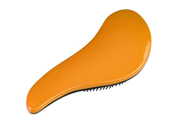 Orange hairbrush isolated on white background. Personal grooming accessory. File contains clipping path.