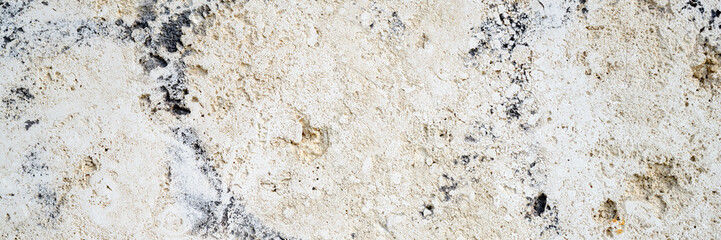 Element of old rough concrete wall as background or texture