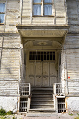 Old white wooden entrance door and of house in Turkey Istanbul Buyukada