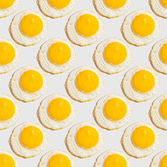 Seamless pattern with sunny side up egg on white background. Food board.