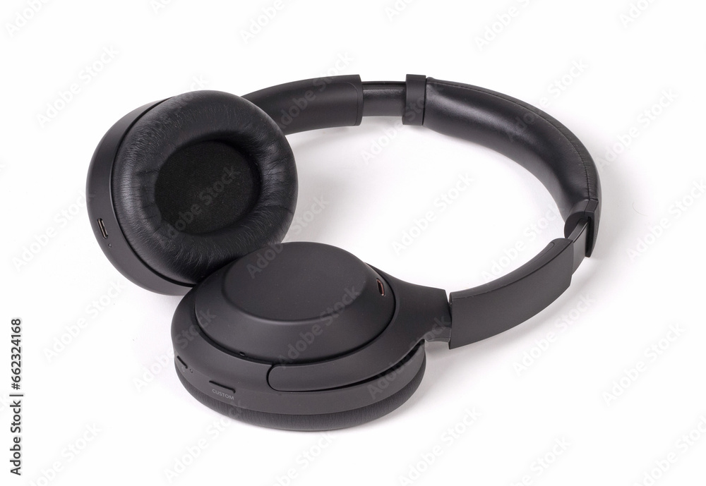 Wall mural wireless headphone on white background