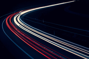 lights of cars driving at night. long exposure