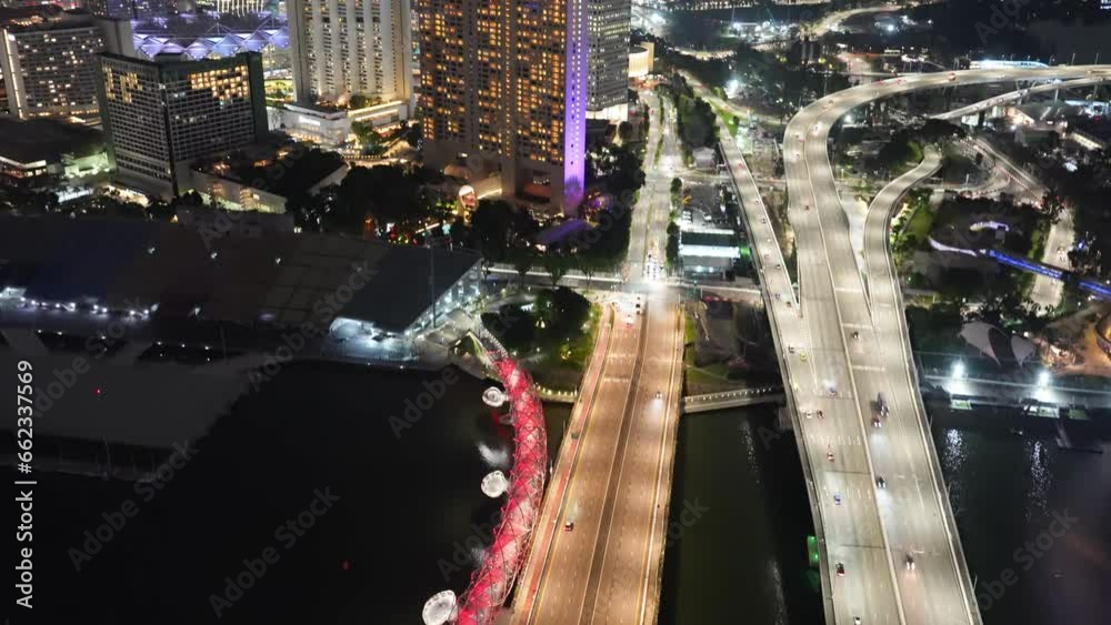 Poster Aerial view of Singapore skyline and major road at night