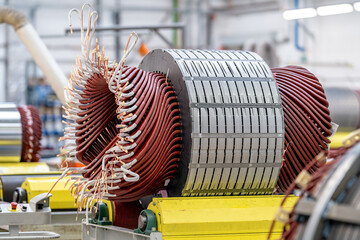 winding the electric motor wire on the production line of the factory