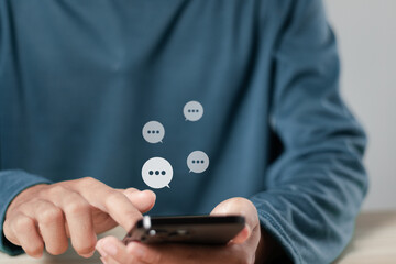Social network concept. Man using smartphone with typing live chat chatting on  communication digital web