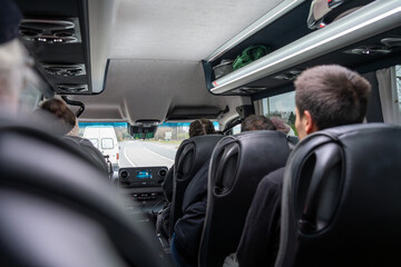 Travelers on a trip in a minibus in County Wicklow near Glendalough, Ireland - obrazy, fototapety, plakaty
