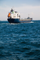 Large cargo ship engaged in international logistics transportation and passing through the Istanbul Bosphorus