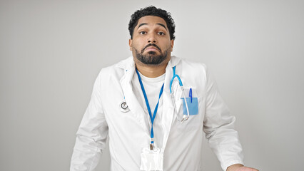 African american man doctor standing clueless over isolated white background