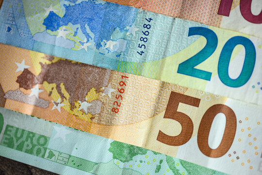 Euro bills close up. Close up shot of 50 and 20 euro bank notes. High quality photo