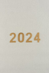 Números de año nuevo de 2024 sobre fondo blanco de fantasía