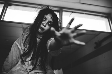 Portrait of asian woman make up ghost,Scary horror scene for background,Halloween festival...