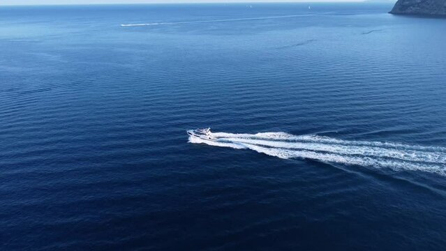 a motorboat traveling in the sea of Argentario
