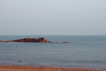 sea and rock at dawn