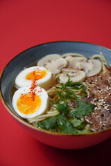 ramen with beef and eggs and mushrooms, asian food