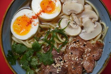 ramen with beef and eggs and mushrooms, asian food