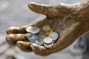 Hand with coins, Istria