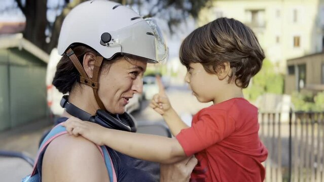 Loving Mother and Son: Affectionate Moments, Smiles, Hugs, and Eye Contact