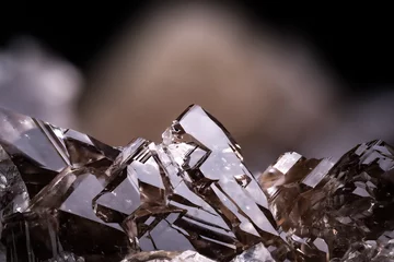 Photo sur Aluminium Alpes skeletal smoky quartz isolated on black background. macro detail close-up rough raw unpolished semi-precious gemstone.