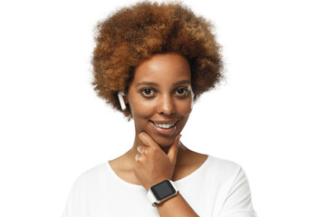 Young african american woman looking at camera, showing smartwatch with blank screen, wearing...